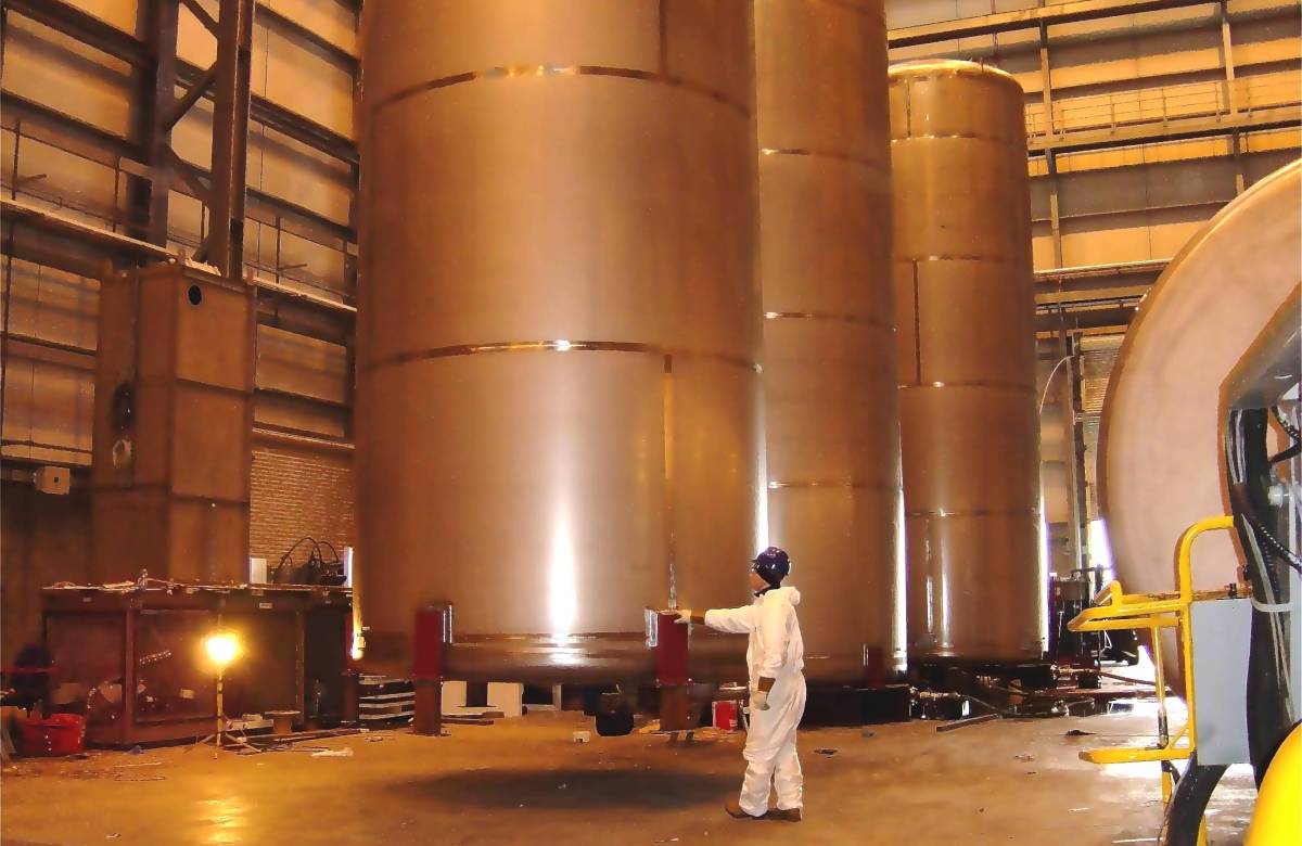 Large bespoke pressure structure manufactured to project specification by JGC Engineering at their world class facilities in Scotland being checked over by JGC Engineering engineer