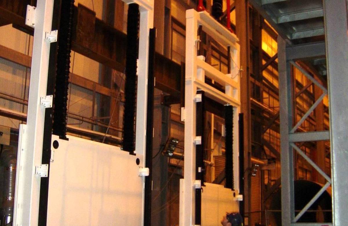 JGC Engineering technician reviewing shielding doors for nuclear client, manufactured and designed by JGC Engineering