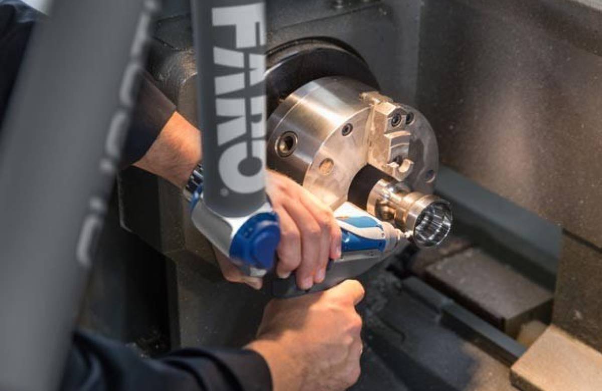 JGC engineering engineer inspecting a product for clients using specialised equiptment