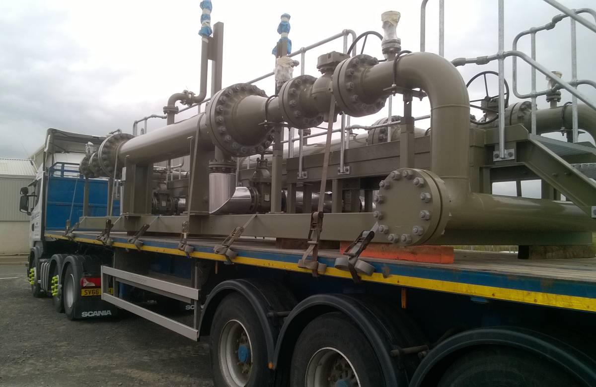 Bespoke steel pipework manufactured and fabricated by JGC Engineering being transported to the project