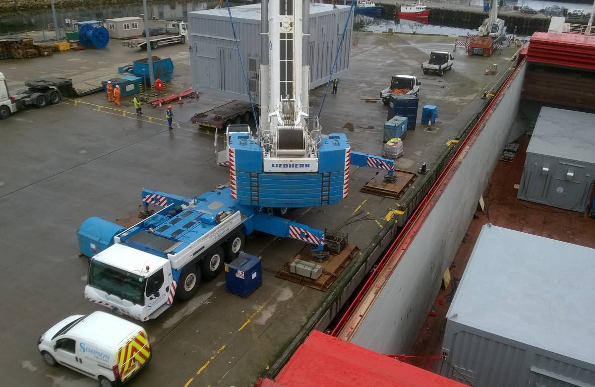 Crane at scrabster, operated by JGC Engineering to load and unload shipping containers